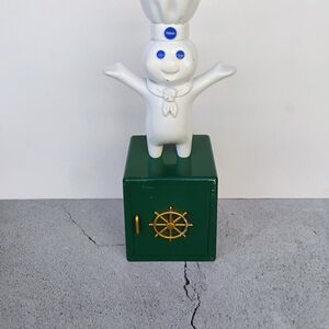 Pillsbury Doughboy Figurine with Green Base